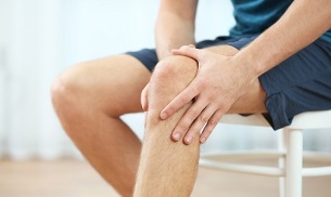 simptomi artroze koljena